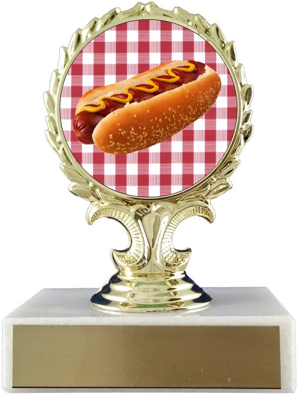 A trophy with a gold base and a red and white checkered background featuring an image of a hot dog on top.